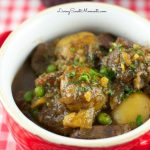 Guinness Beef Stew - Slow cooker beef stew made with beef and hearty veggies served with a delicious Guinness Beer sauce. Perfect irish stew recipe.